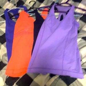 4 Lululemon workout tanks